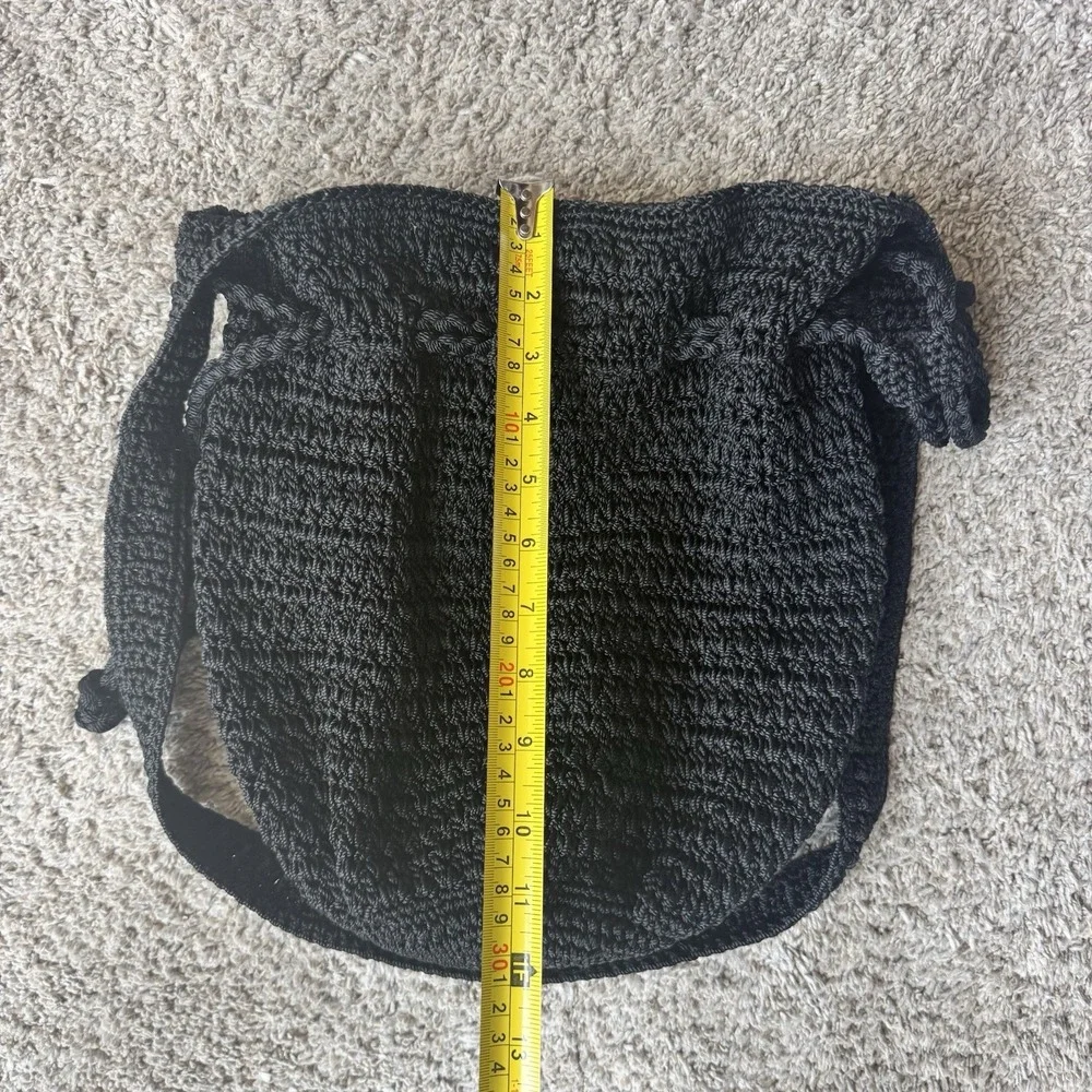 THE SAK Crochet Drawstring Purse Backpack Black Bucket Handbag Excellent
